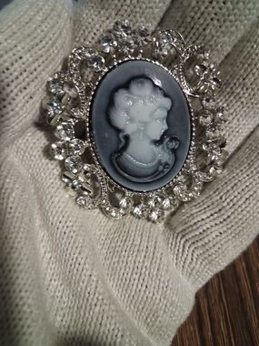Elegant Black & White Cameo Brooch with Crystal Frame